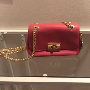 Pink cross body coach purse